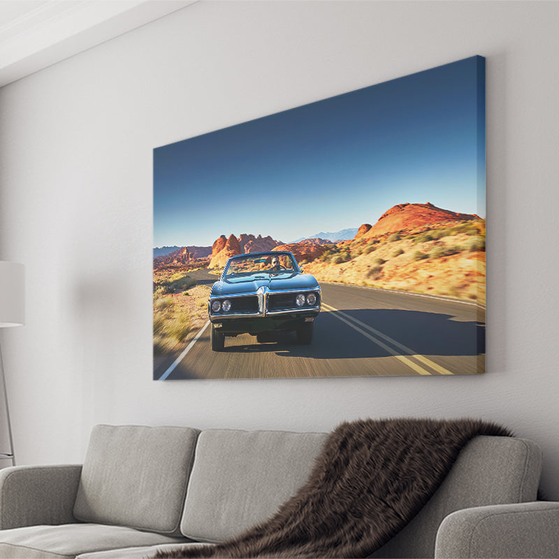 Man driving vintage car through desert Canvas Prints Wall Art - Painting Canvas, Wall Decor, Home Decor, Prints for Sale