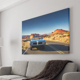 Man driving vintage car through desert Canvas Prints Wall Art - Painting Canvas, Wall Decor, Home Decor, Prints for Sale